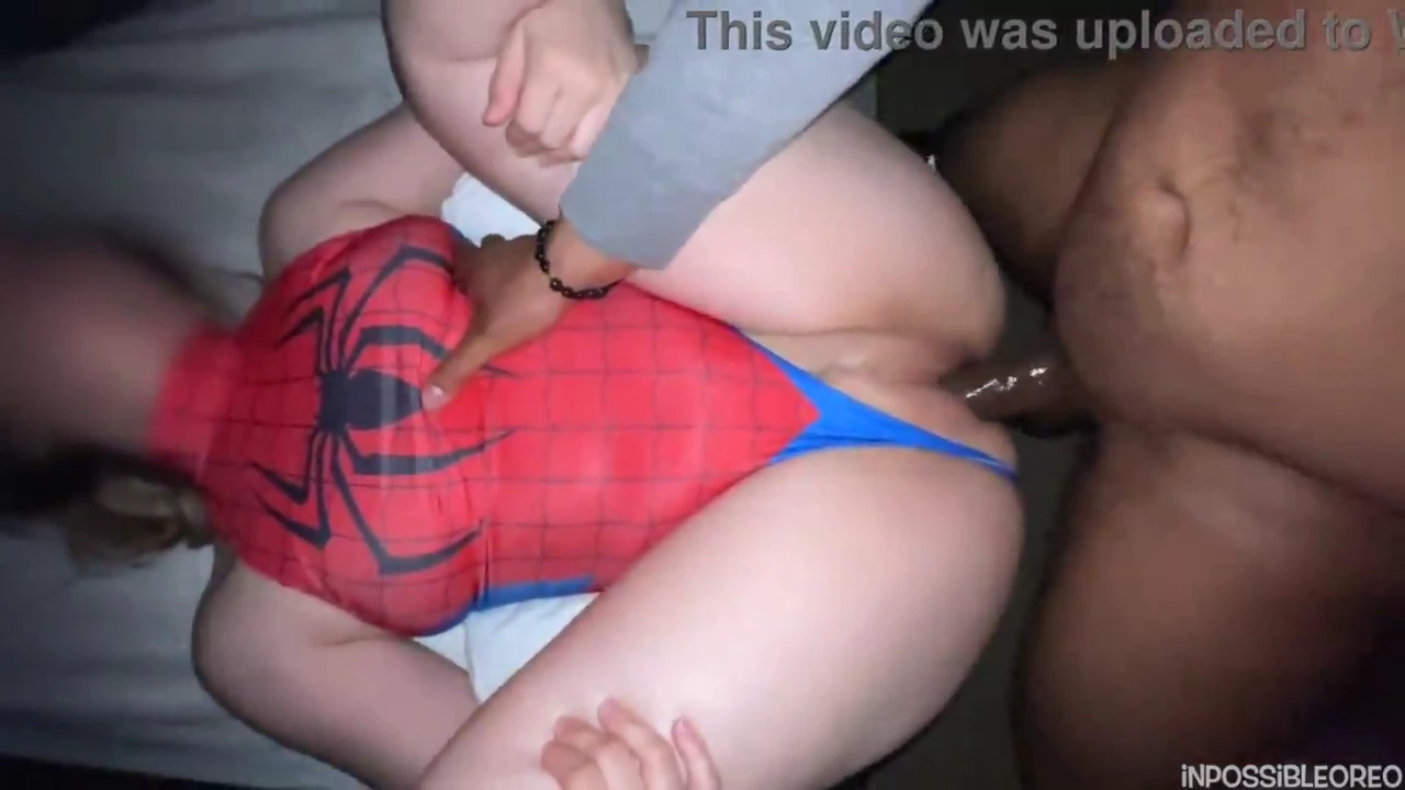 Spider-themed woman engages in sexual intercourse with a man of African descent porn video